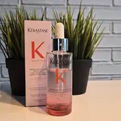 Serum Kérastase Genesis, który według wielu **kerastase opinie** pomaga w walce z wypadaniem włosów.