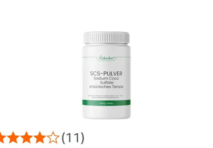 Biały pojemnik z zielonym logo Nakobe, zawierający proszek SCS-PULVER Sodium Coco Sulfate.