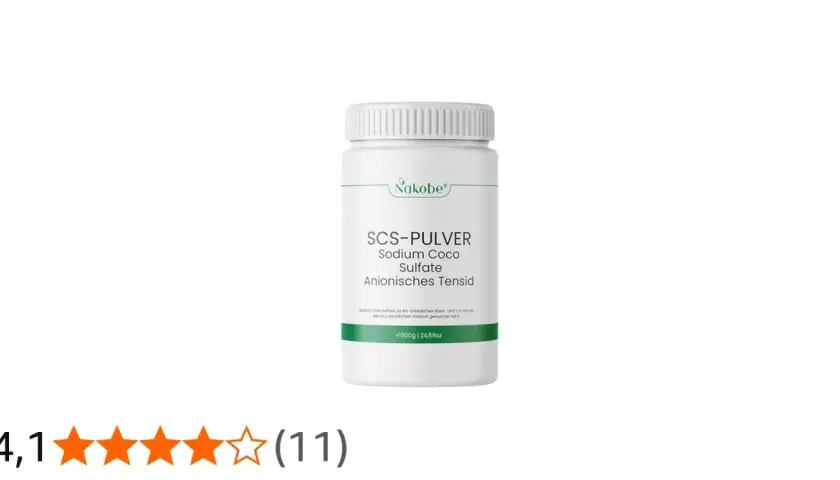 Biały pojemnik z zielonym logo Nakobe, zawierający proszek SCS-PULVER Sodium Coco Sulfate.