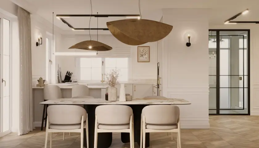 Elegancka jadalnia z marmurowym stołem i beżowymi krzesłami, oświetlona designerskimi lampami. To kwintesencja quiet luxury.